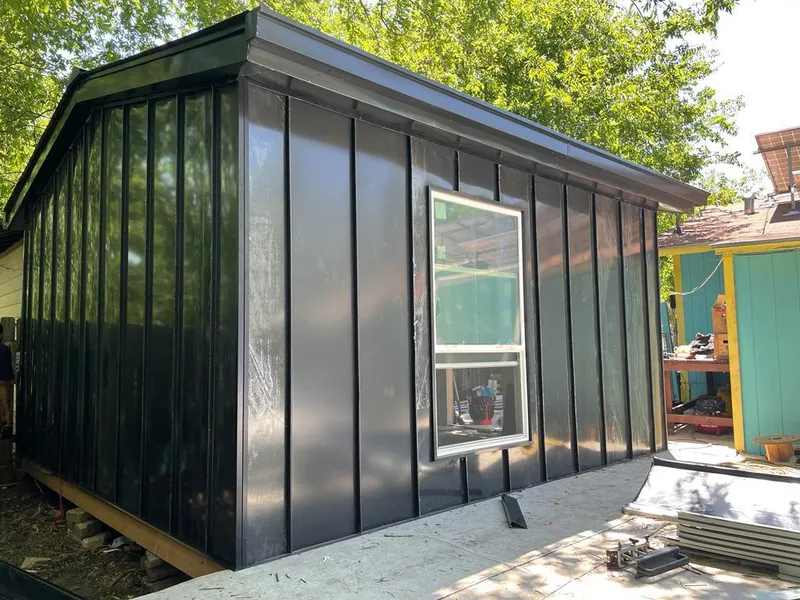 Black standing seam metal wall panels for Metal Roof Installation in South River